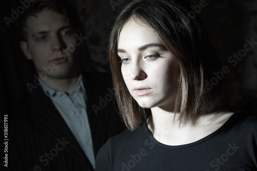 Girl's face in black clothe...