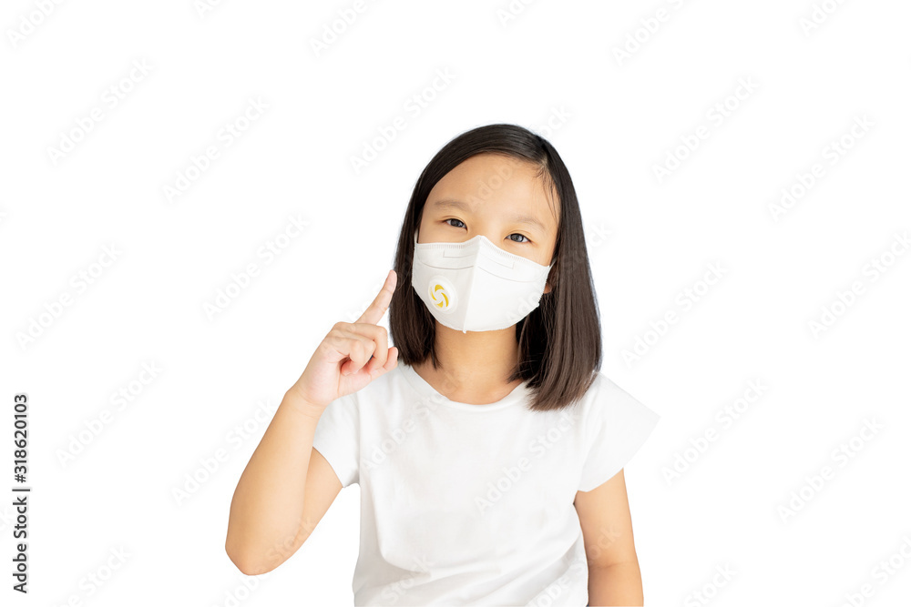 Asian little girl wearing a dust mask protect for PM2.5 and as protection new coronavirus 2019-nCoV, isolated over white with clipping path.