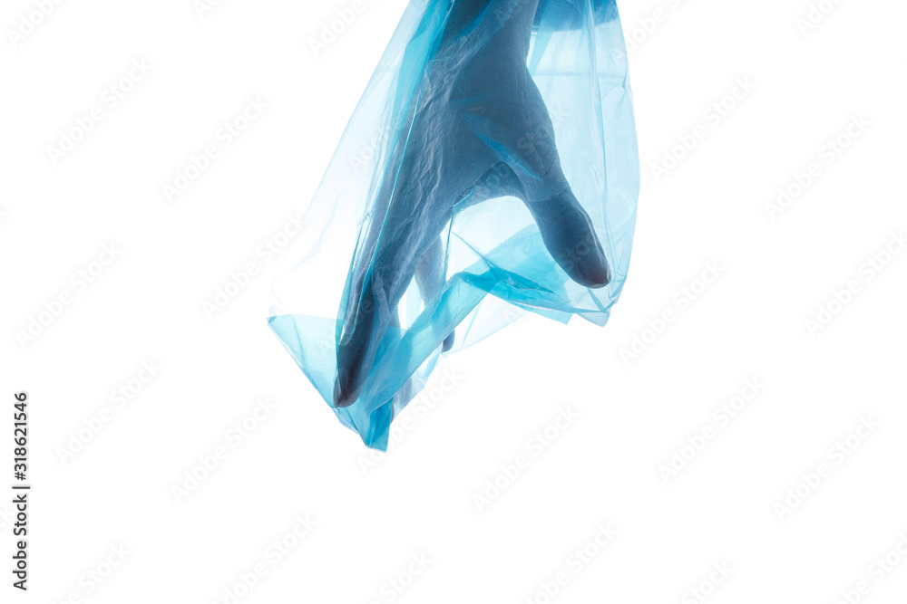 Silhouette of hand try to catch and stuck in blue plastic bag isolated on white background, plastic pollution and environmental problem, global warming and zero waste concept. Silhouette of hand try to catch and stuck in blue plastic bag isolated on white background, plastic pollution and environmental problem, global warming and zero waste concept.