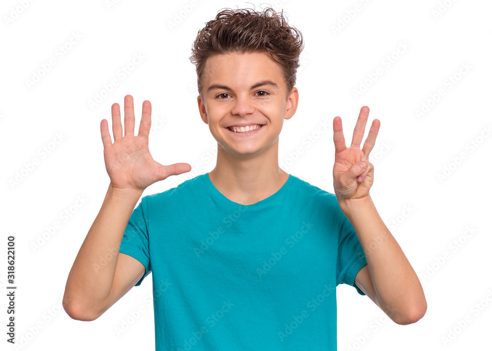 Portrait of happy teen boy showing two palms - 8 fingers, isolated on white background. Happy smiling child doing gesture of number Eight. Series of photos count from 1 to 10.