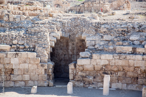 Old Roman ruins in Israel with an arched doorway