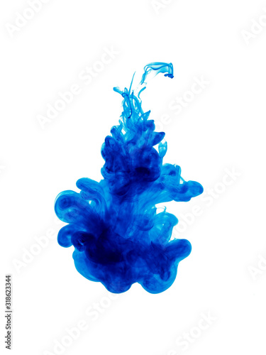 Abstract flowing fluid. Clouds of blue color ink in water. Isolated on white background.