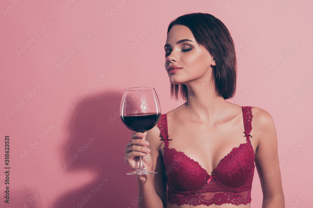 Portrait of her she nice sweet lovely attractive gorgeous glamorous winsome charming lady girlfriend wife holding red wine 8 march congrats aroma isolated over pink pastel background Portrait of her she nice sweet lovely attractive gorgeous glamorous winsome charming lady girlfriend wife holding red wine 8 march congrats aroma isolated over pink pastel background