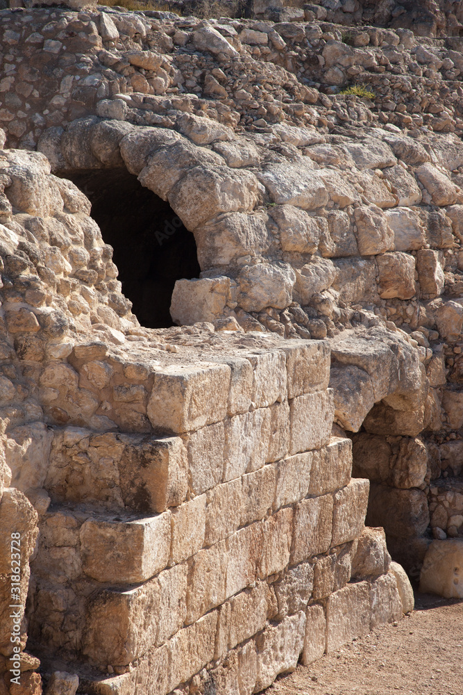 Old Roman ruins in Israel with an arched doorway