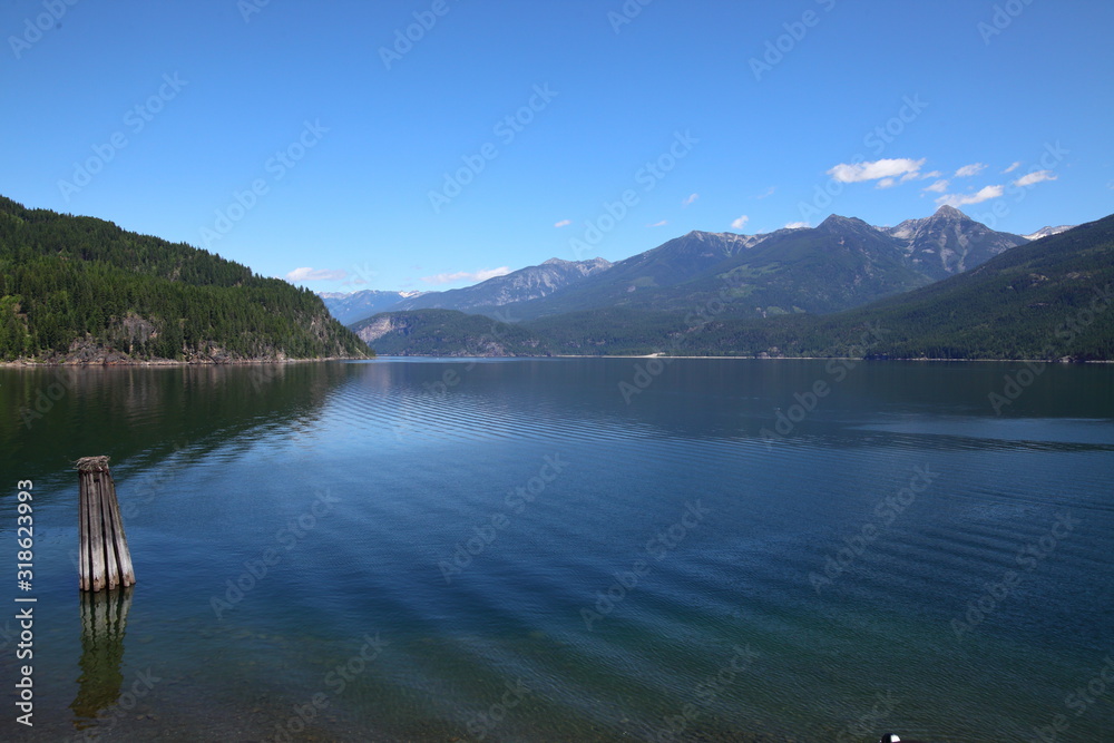 Lake, Mountain lake, alpine meadows and rocky summits in the Rocky Mountains in Canada, British Columbia, West coast