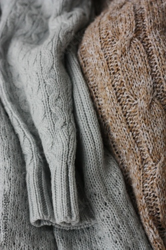Beautiful knitted grey and brown sweaters macro