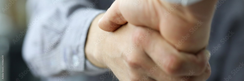 Two business people shaking hands as future prospects symbol close-up Two business people shaking hands as future prospects symbol close-up