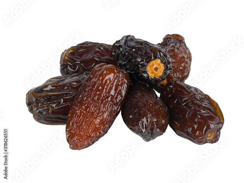 Bild auf Leinwand Closeup of several fruits of dried dark date