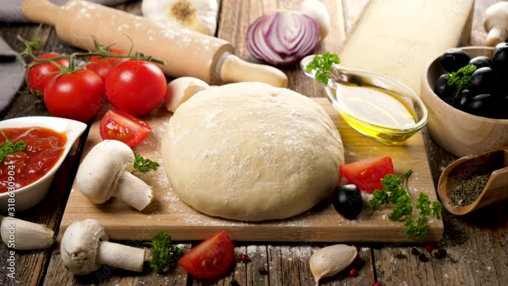 raw dough pizza on board with ingredient raw dough pizza on board with ingredient