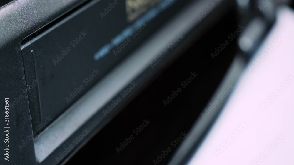 Vidéo Stock Closeup on a vintage VHS video cassette recorder ejecting