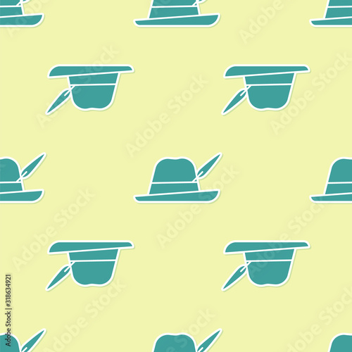 Green Oktoberfest hat icon isolated seamless pattern on yellow background. Hunter hat with feather. German hat. Vector Illustration