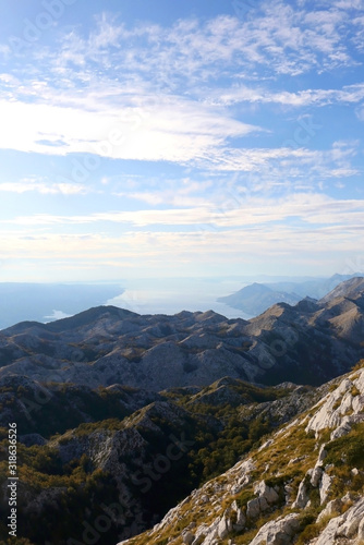 Fototapeta Naklejka Na Ścianę i Meble -  Beautiful view of Biokovo mountain and Adriatic sea from St. Jure peak in Dalmatia, Croatia.