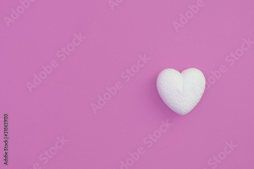 White hearts on a pink background