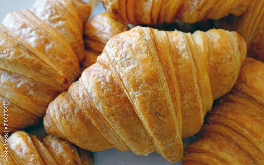 Freshly baked French croissants at a bakery