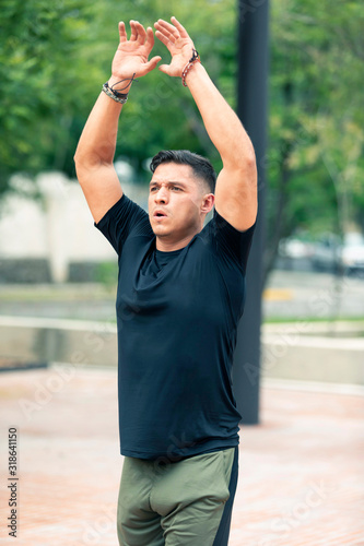 Young man exercising outdoors.