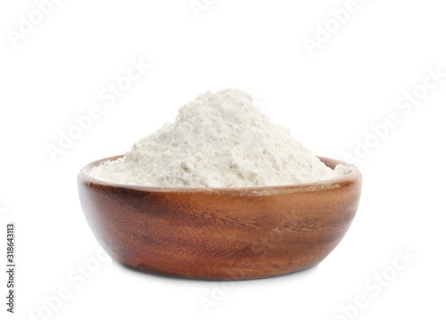 Organic flour in wooden bowl isolated on white
