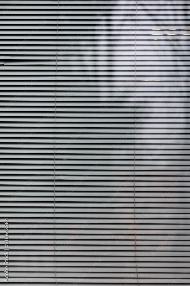 abstract striped background of window blinds abstract striped background of window blinds