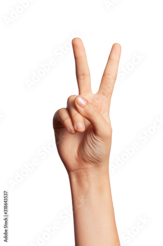 woman on white background is pointing at number four