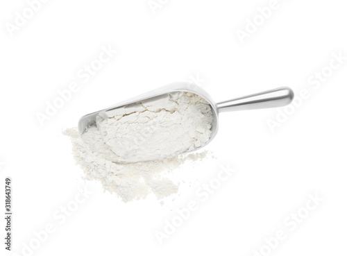 Scoop with flour isolated on white, top view
