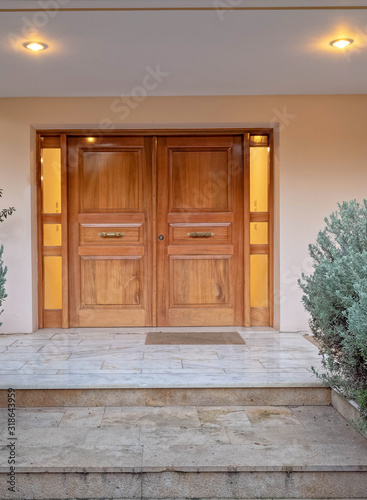 luxury house entramce wooden door early in the evening, Athens Greece