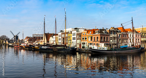 Boats in harbor Leiden blue sky photo