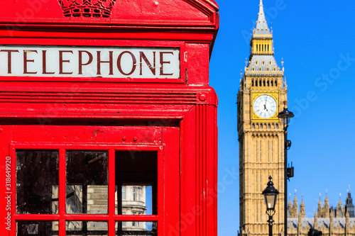 Iconic red telephone box with Big Ben in the background