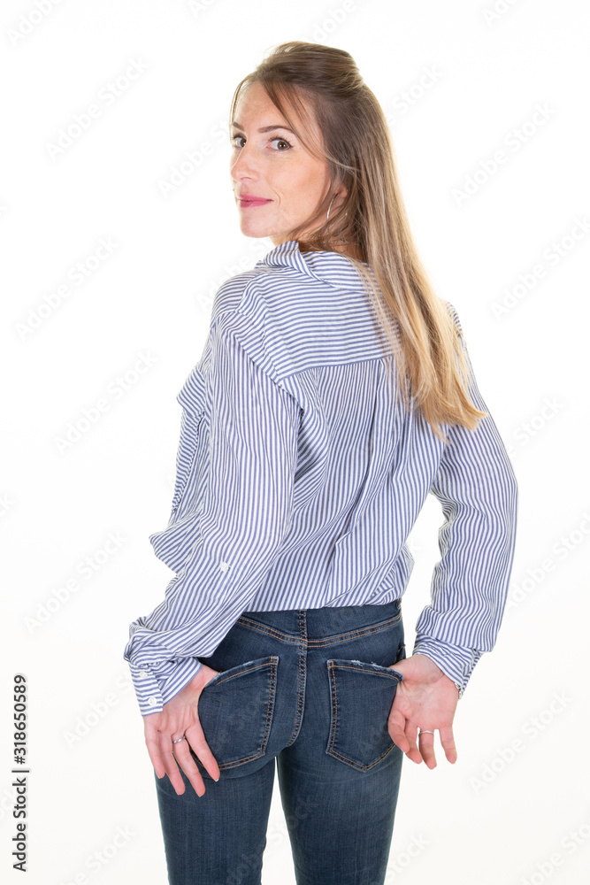 Young woman over isolated white background looking to back rear side Young woman over isolated white background looking to back rear side