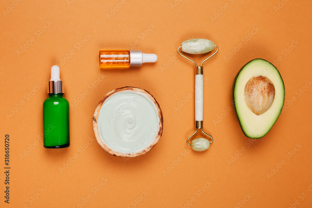 Modern accessories and herbal cosmetics for natural face care. Flat lay style. Modern accessories and herbal cosmetics for natural face care. Flat lay style.