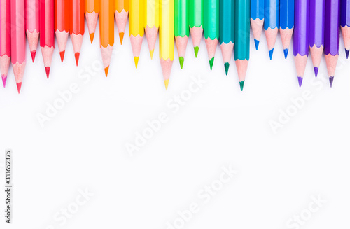 Different color pencils on white background. Composition with colored pencils  closeup view  space for text