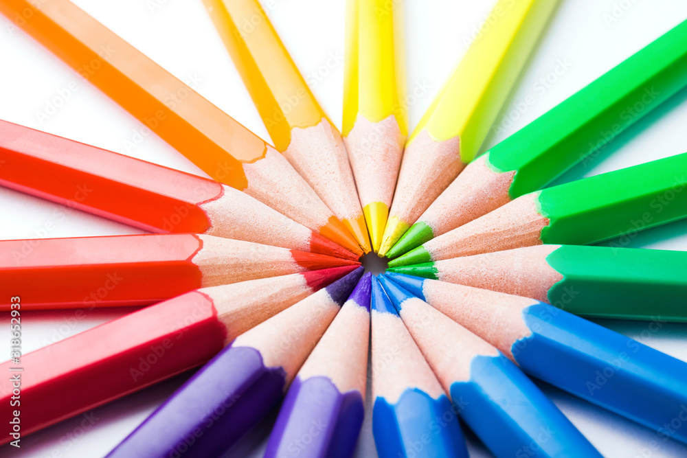 Different color pencils on white background. Composition with colored pencils, closeup view Different color pencils on white background. Composition with colored pencils, closeup view