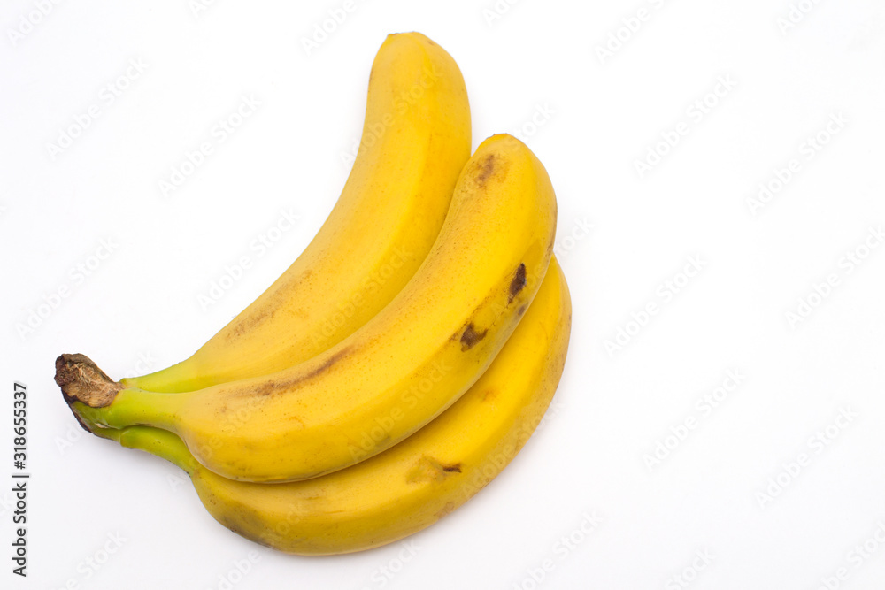 Bunch of ripe bananas isolated on a white background.