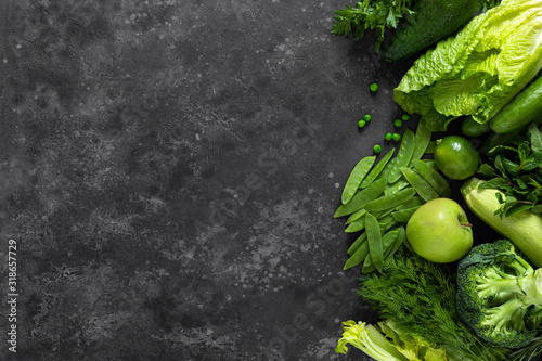 Fototapeta Naklejka Na Ścianę i Meble -  Healthy food, fresh raw green organic fruits and vegetables, clean eating, vegetarian food concept background, top view