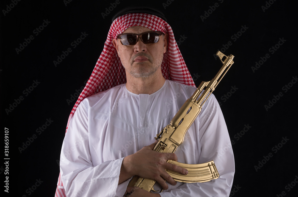 Naklejka premium man with a golden assault rifle AK-47