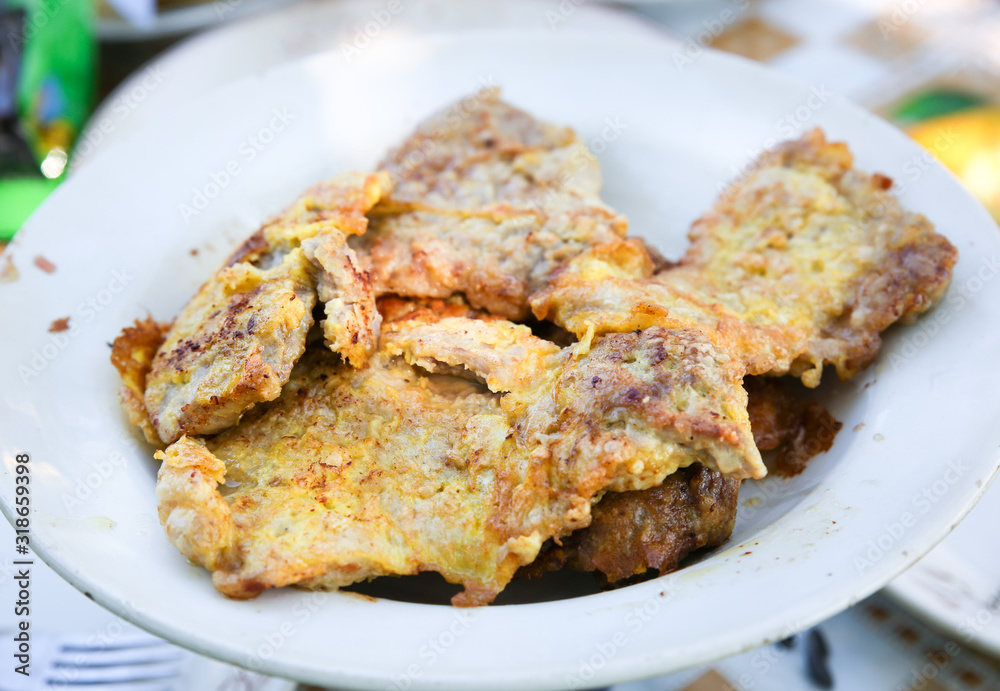 Cutlet meat lying on the plate. Homemade cuisine.