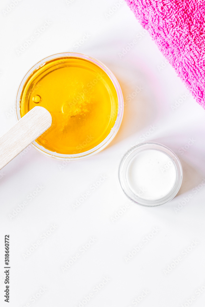 concept depilation with wax on white background top view