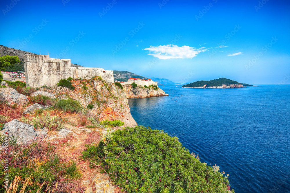 Aerial view at famous travel destination city of Dubrovnik - Fort Lovrijenac on a sunny day
