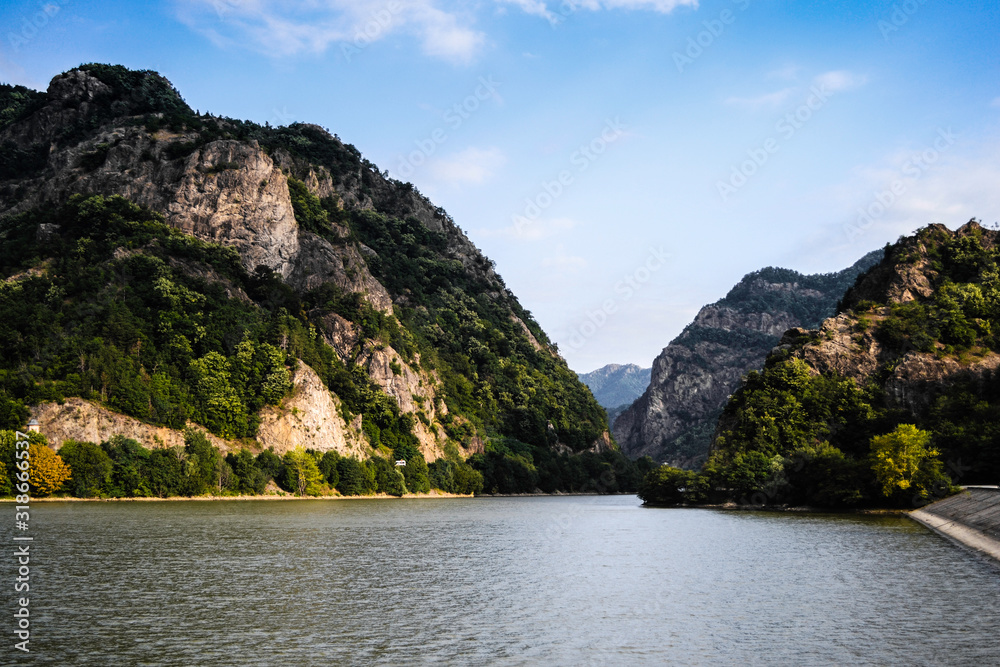 Landscape with the valley of Olt river between the mountains.