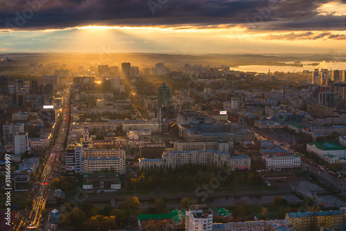 view of the evening evening morning city center with a river pond after rain dawn sunset in the city of yekaterinburg iset sverdlovsk ural russia © Evgeniy Sazhin