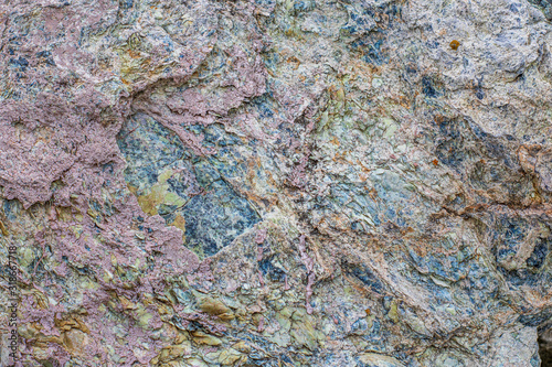 Amazind multicolored background texture of natural rock stone photo