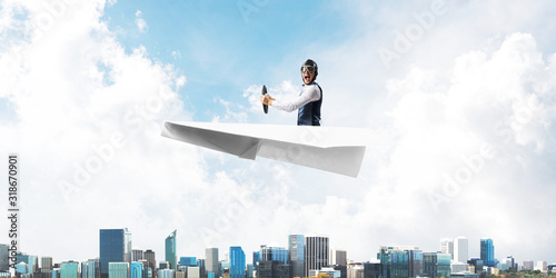 Business motivation concept with pilot airplane