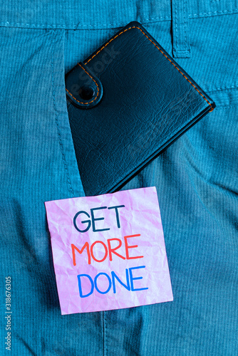 Text sign showing Get More Done. Business photo text Checklist Organized Time Management Start Hardwork Act Small little wallet inside man trousers front pocket near notation paper photo