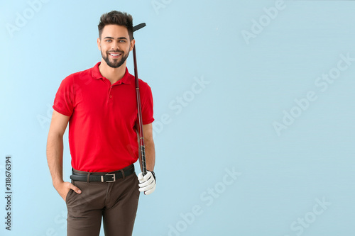 Handsome male golfer on col...