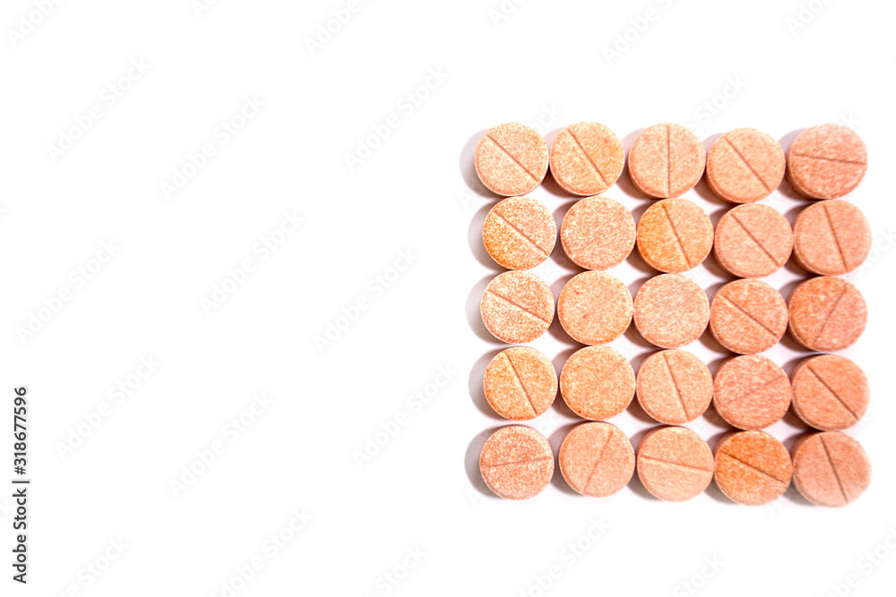 Vitamins pills or medicine on a white background