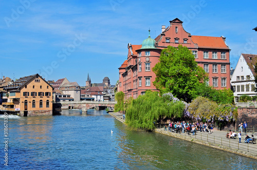 Cityscape with water and houses in Strasbourg France