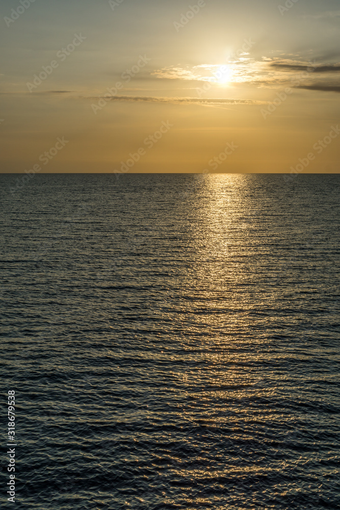 Fototapeta premium Sun reflecting of the water at Awaza beach Turkmenbashi, Turkmenistan. 