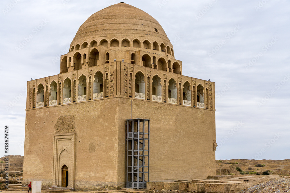 Mausoleum of Soltan Sanjar in Old Merv, Mary, Turkmenistan on a clouded background. 