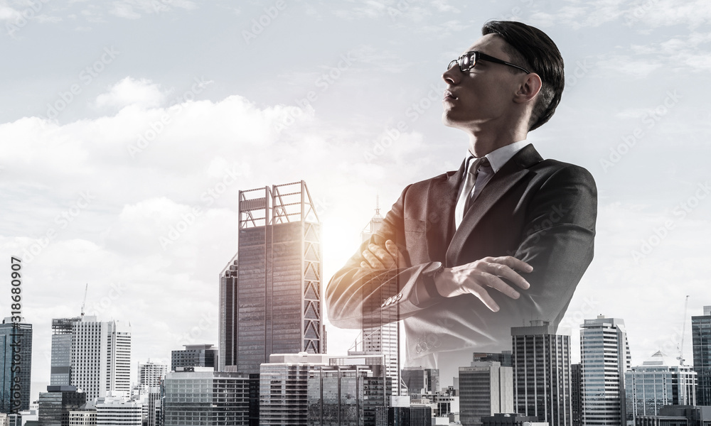 Concept of business success and control with confident boss against cityscape background Concept of business success and control with confident boss against cityscape background
