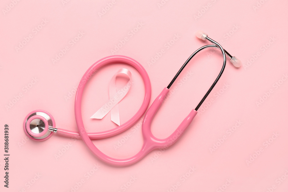 Pink ribbon with stethoscope on color background. Breast cancer awareness concept Pink ribbon with stethoscope on color background. Breast cancer awareness concept