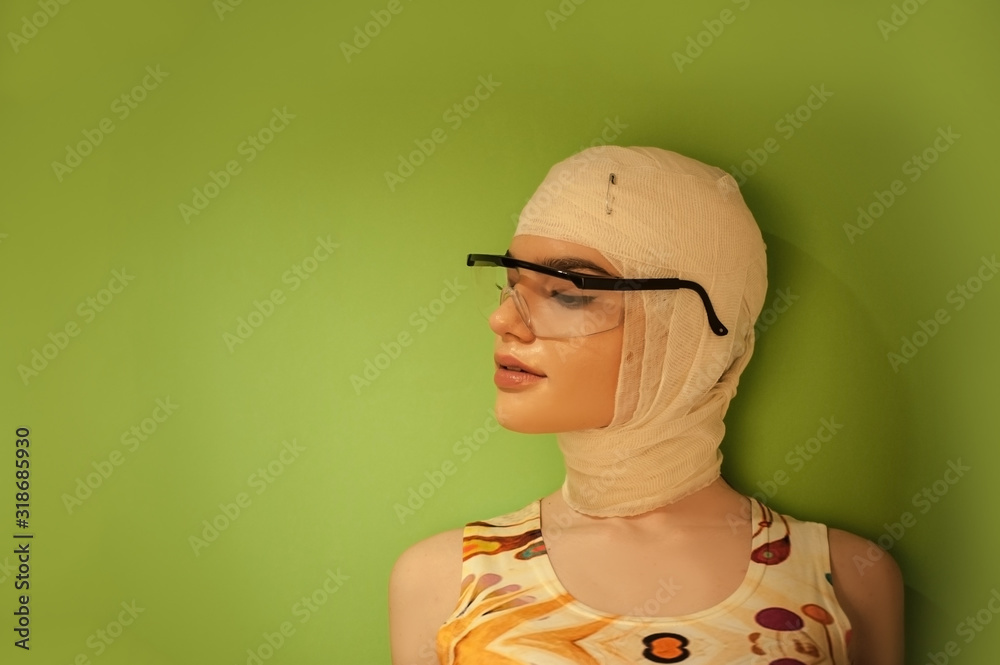 Plastic surgery concept, beauty woman with bandage, isolated on fresh green background with copy space Plastic surgery concept, beauty woman with bandage, isolated on fresh green background with copy space