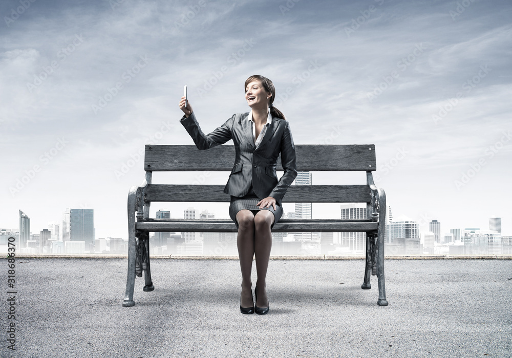 Business woman taking selfie photo or chatting Business woman taking selfie photo or chatting